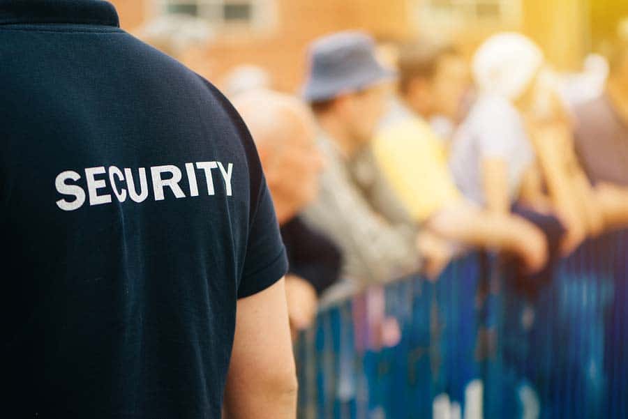 Uniformed security guard patrolling a commercial property in Southern California, providing professional safety and protection services.”This alt text is concise, descriptive, and includes keywords to enhance SEO while remaining accessible. Let me know if you'd like any tweaks!