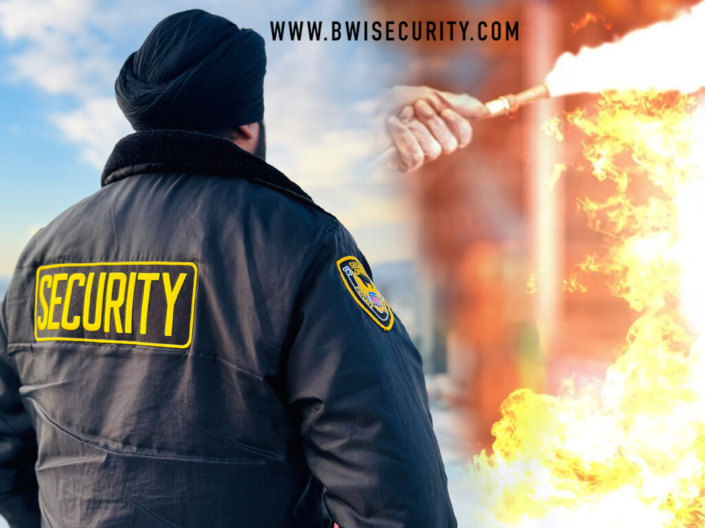 BlueWolf firewatch security guard monitoring site with fire safety in the background